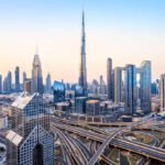 the skyline of dubai during sunrise